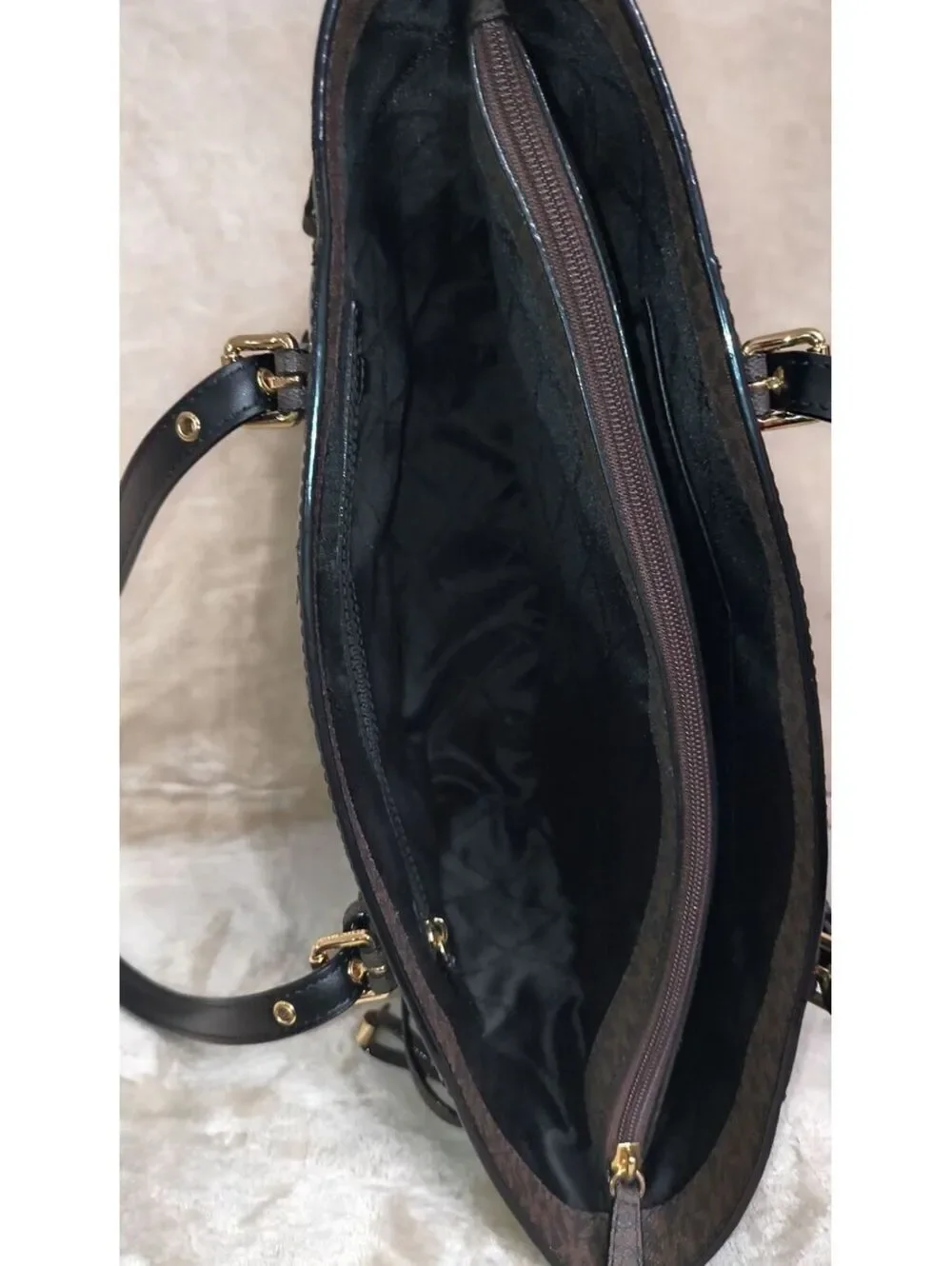 48. Michael Kors Voyager East/West Tote